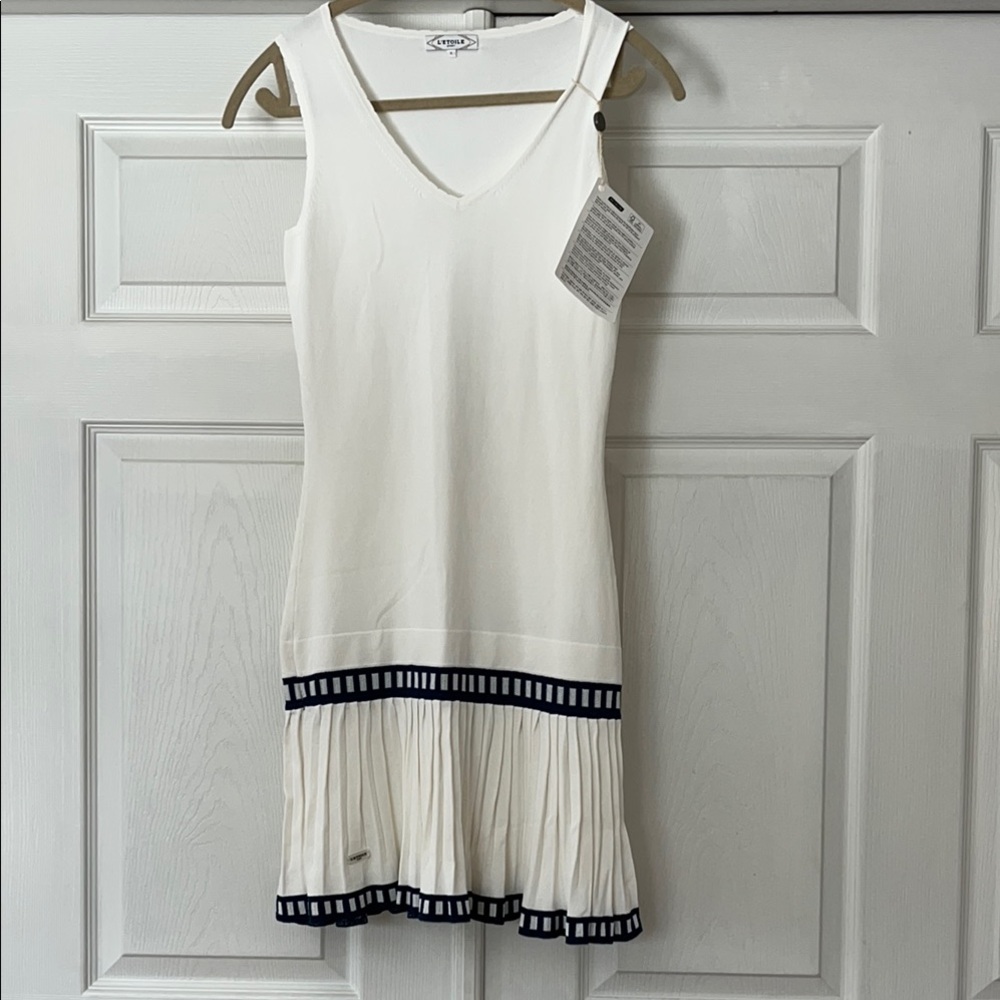 White Sleeveless V-Neck Mini Dress with Ruffled Hem